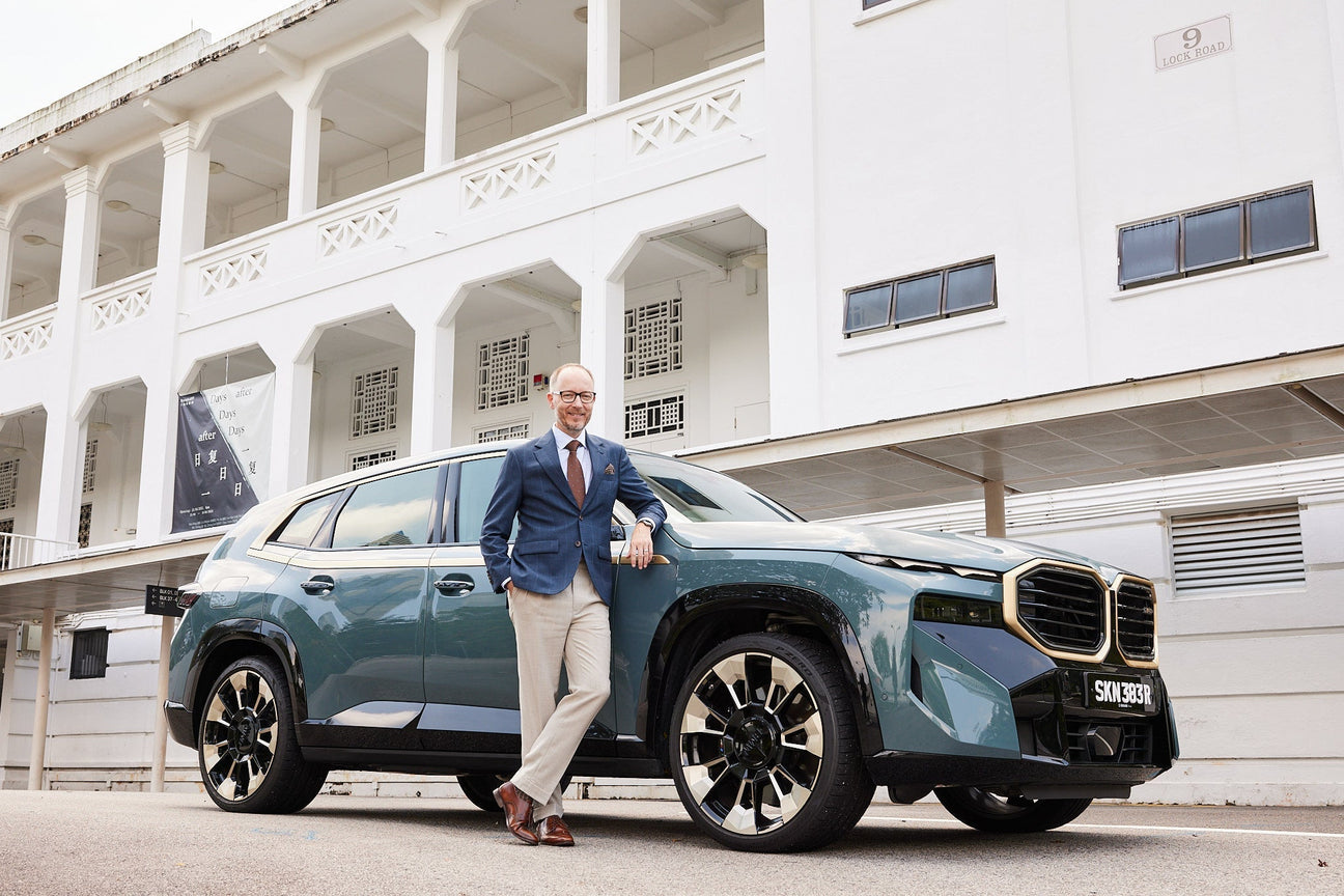 Lars Nielsen decked in Benjamin Barker Tailors with the BMW XM