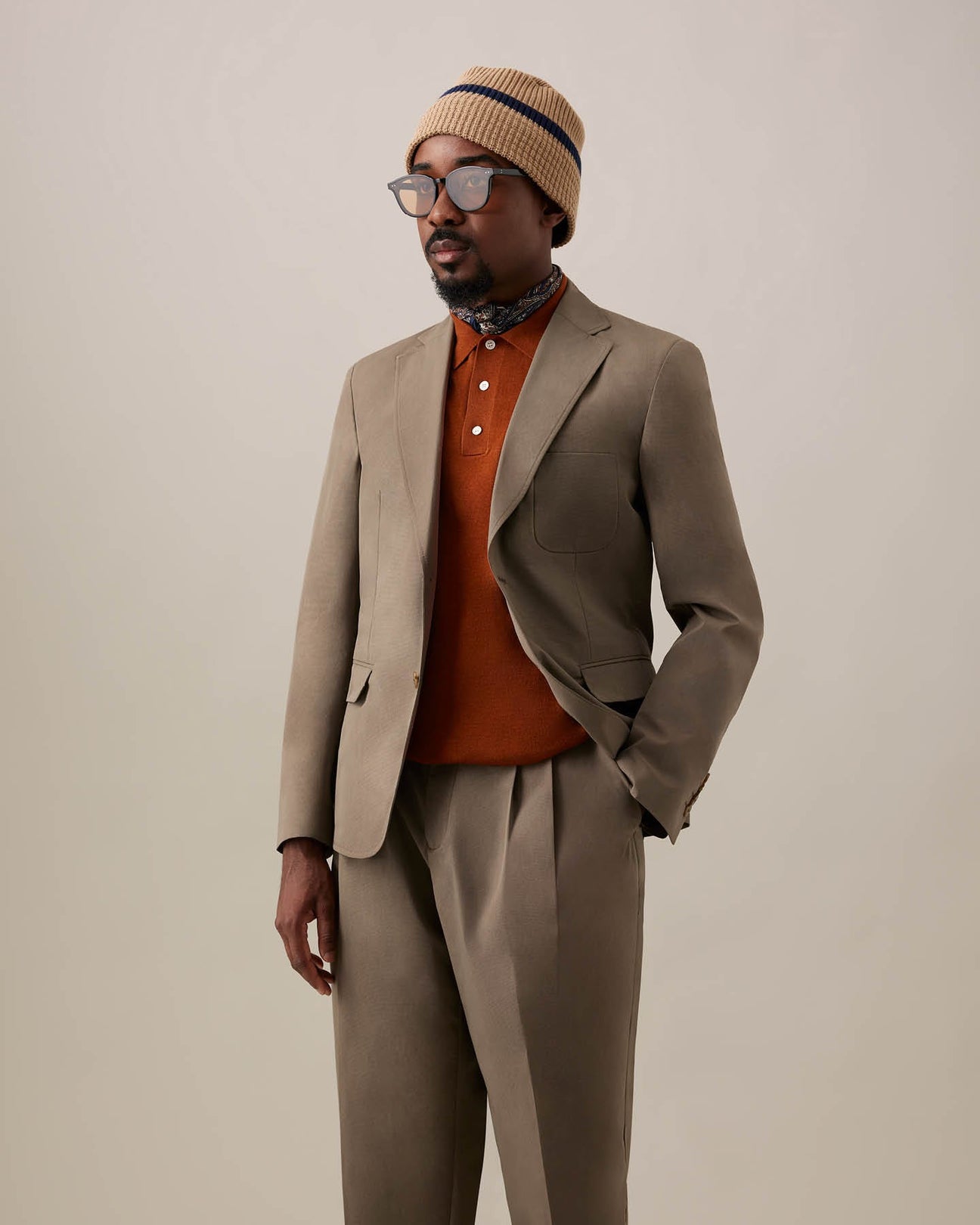 Benjamin Barker’s Wool Silk Tennis Polo layered with Shimizu Breen Sports Jacket and pants.  Polo Tee.